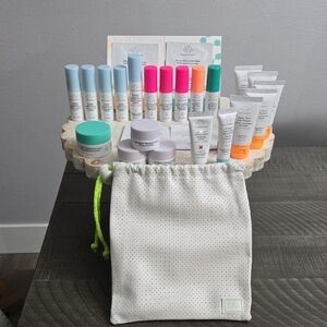 Drunk Elephant Skincare Collection with White and Green Pouch